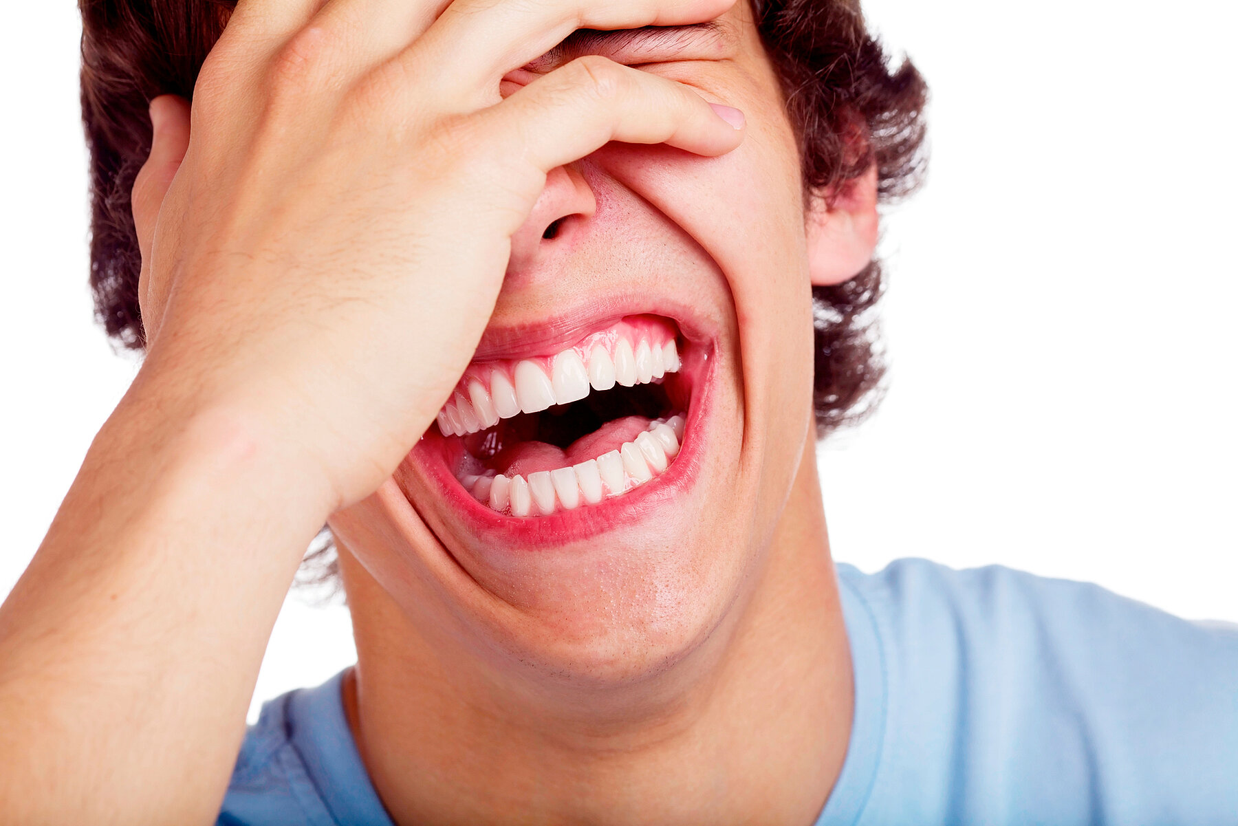 Laughing guy closeup Close up portrait of hard laughing young man. Isolated on white background, mask included