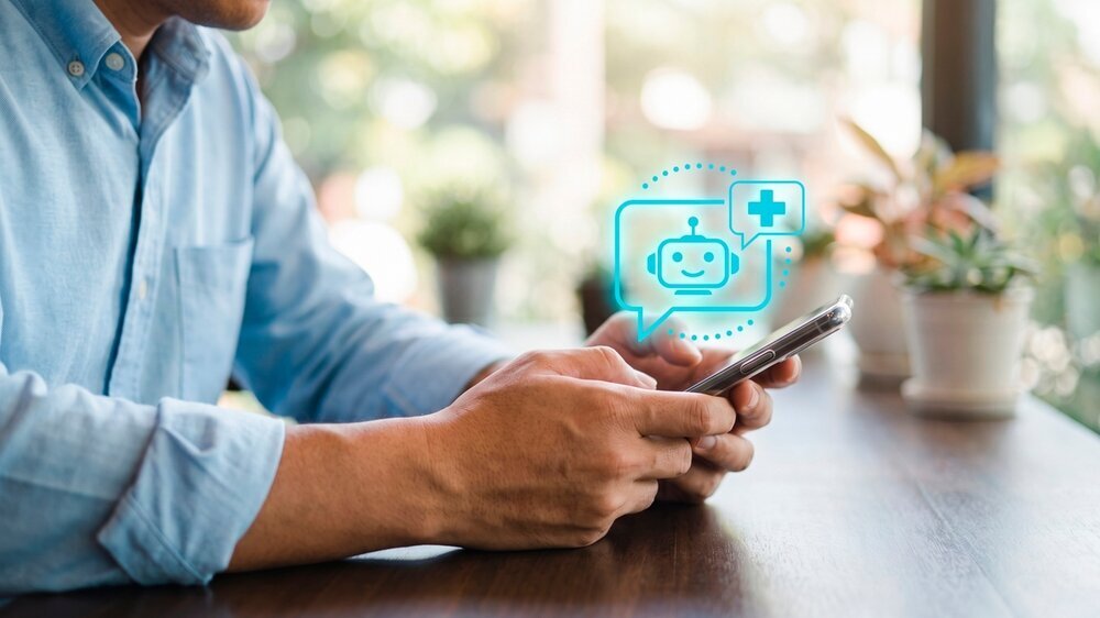 Man using smartphone with AI medical chatbot hologram for telehealth consultation and digital healthcare support Close up of an adult man using a smartphone with a virtual AI medical chatbot icon, representing telemedicine, digital healthcare, patient support, mobile health apps, and online consultation technology.